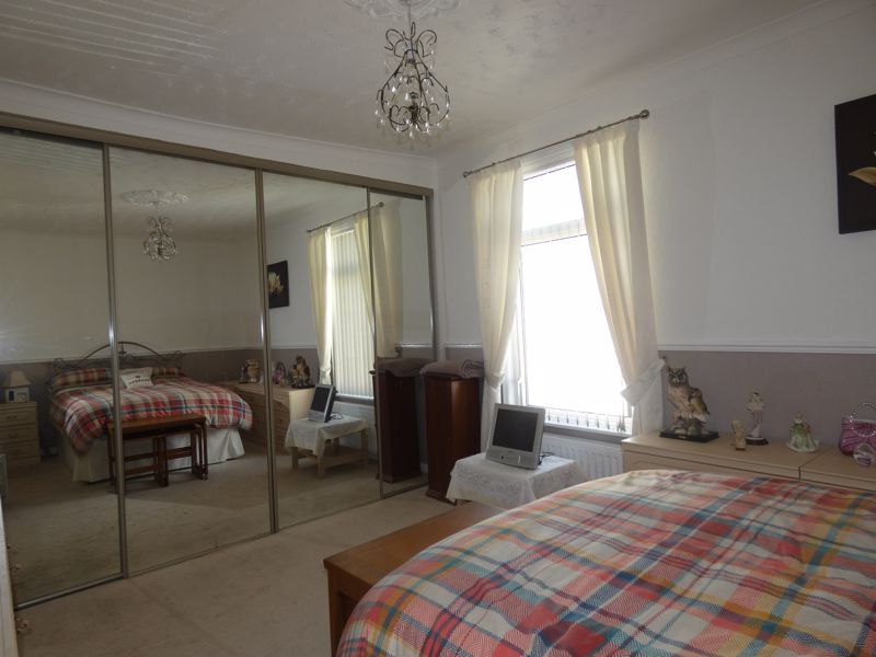 Bedroom One- click for photo gallery